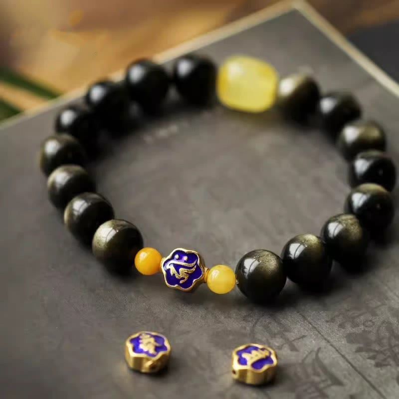 Obsidian Armband mit gelben Steinen und blauen Verzierungen Schutzarmband.