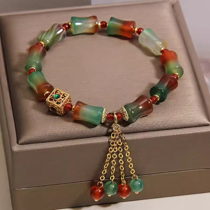 Armband Achat Bambus Mut grün rot Quaste goldene Kette Schmuckbox