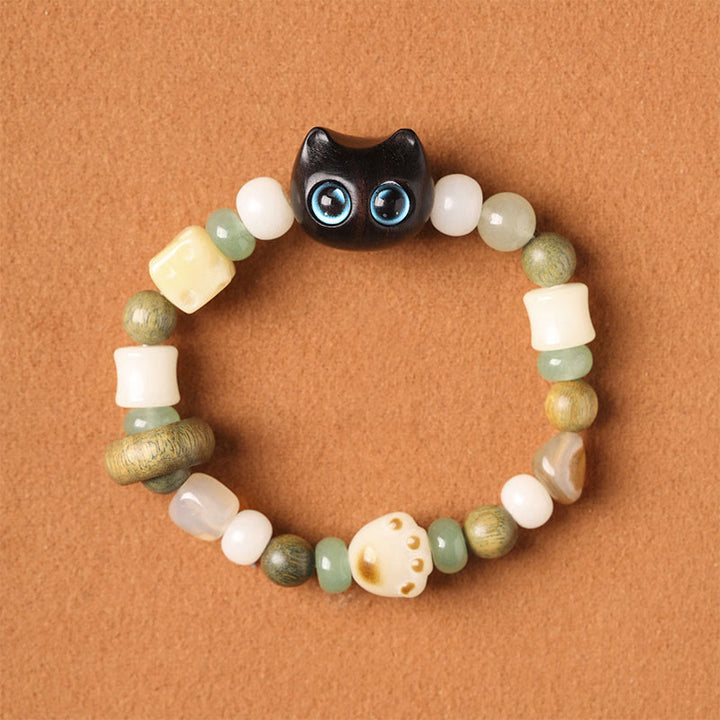 Armband Sandelholz Bodhi Katze mit weißen und grünen Perlen Frieden