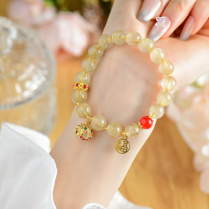 Armband Fu-Zeichen Wohlstand mit Citrin Perlen goldenen Charms elegant