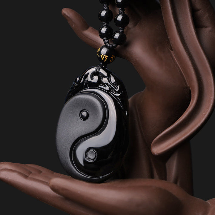 Anhänger Obsidian Yin Yang schwarzer Naturstein Kraft Erfüllung Perlen