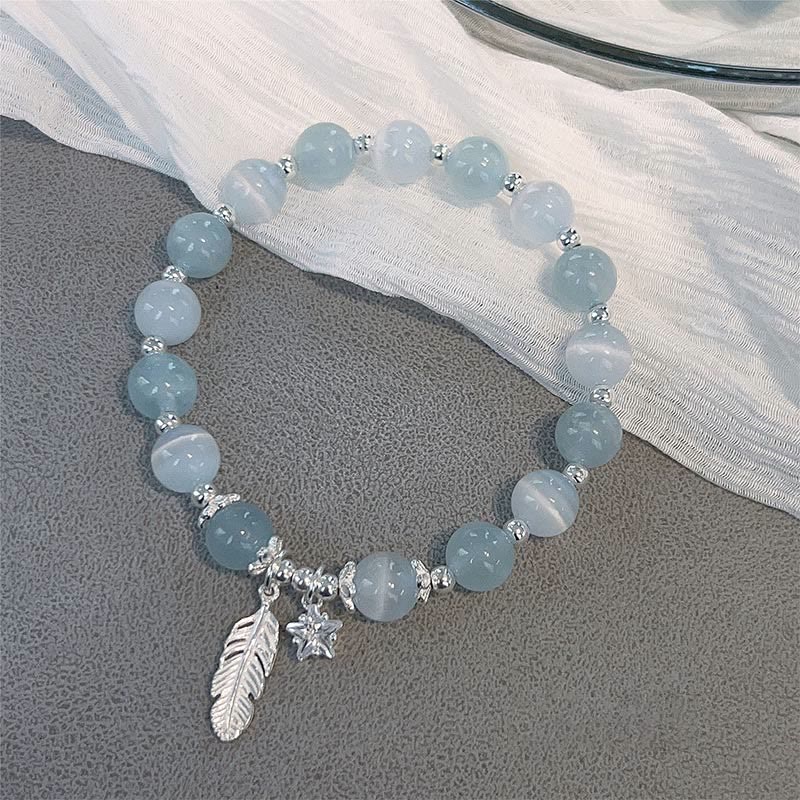 Aquamarin Armband 925 Silber mit Stern und Feder Anhänger elegant