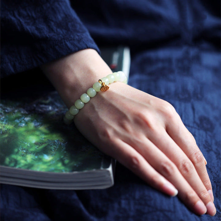 Jade Lotus Armband Handgelenk grüne Perlen goldener Anhänger elegant