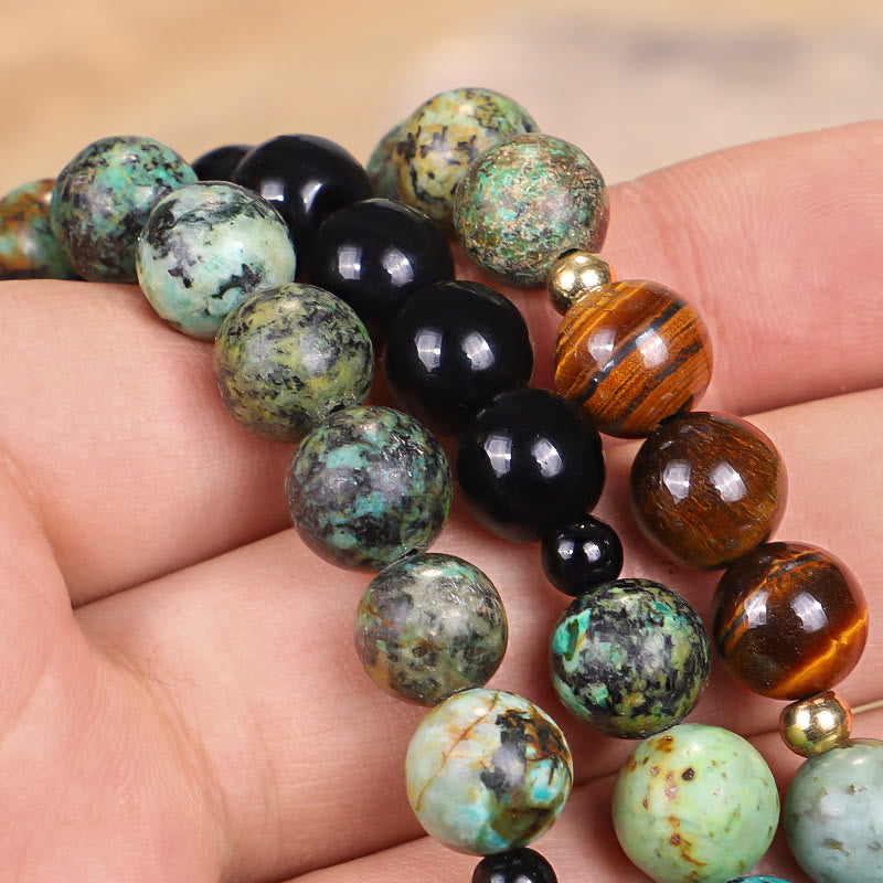 Mala Tigerauge Türkis Armband mit Natursteinen am Handgelenk getragen