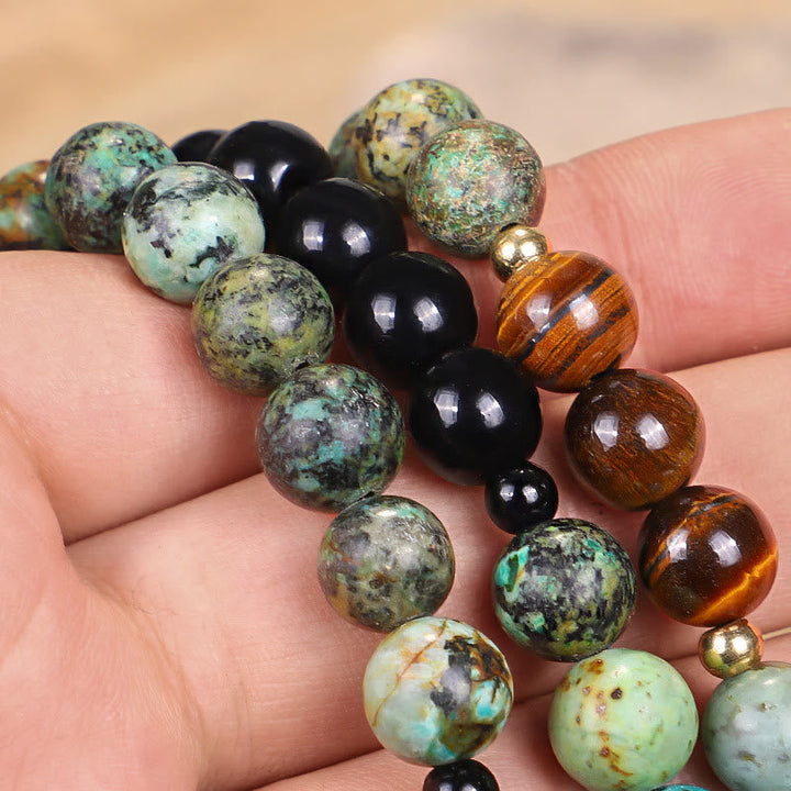 Mala Tigerauge Türkis Armband mit Natursteinen am Handgelenk getragen