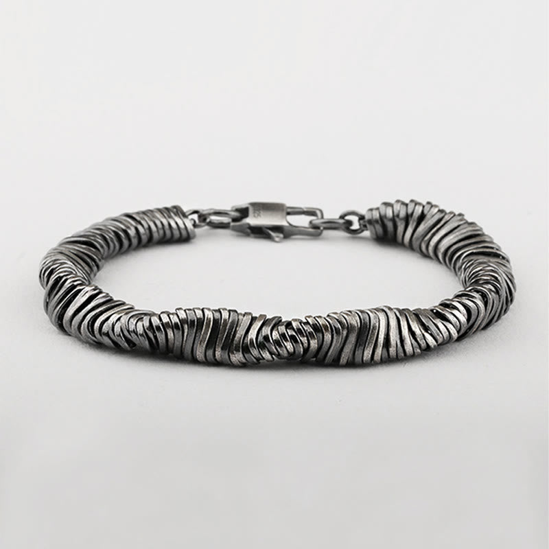 Silbernes Heilungs-Wohlstands Armband 925 Silber gedreht elegant getragen