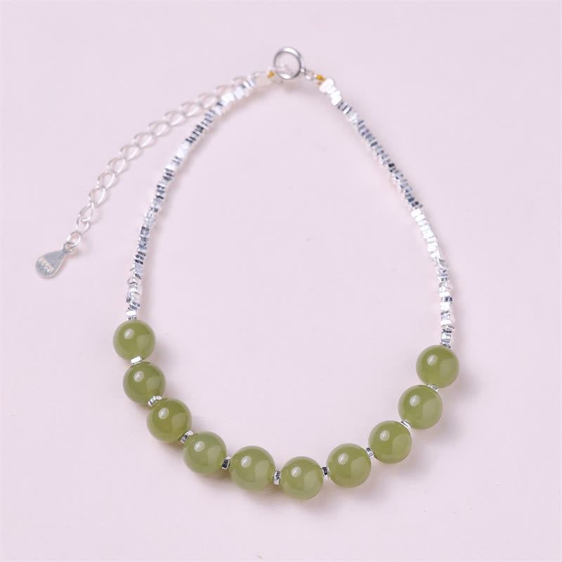Grünes Jade Armband 925 Silber mit Glückssteinen elegantes Design.