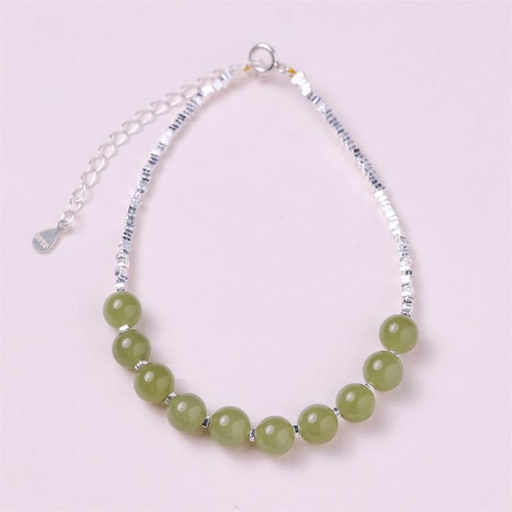 Grünes Jade Armband 925 Silber mit Glückssteinen elegantes Design.