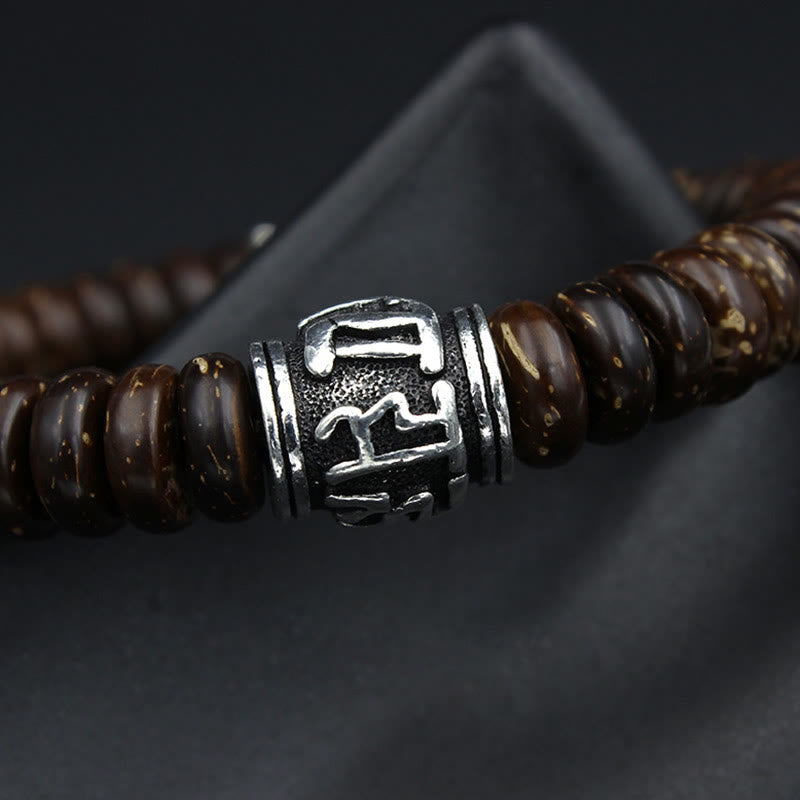 Armband Om Mani Padme Hum – Energie mit Kokosholz und Silberperle.