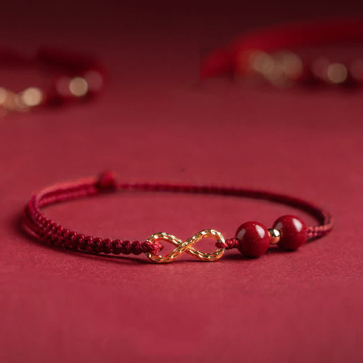 Armband Rotes Band Gold Infinity Symbol