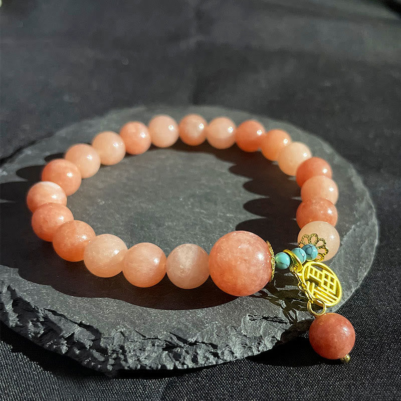 Orangenrot Perlen Armband mit goldenem Fu-Zeichen Charm Türkis