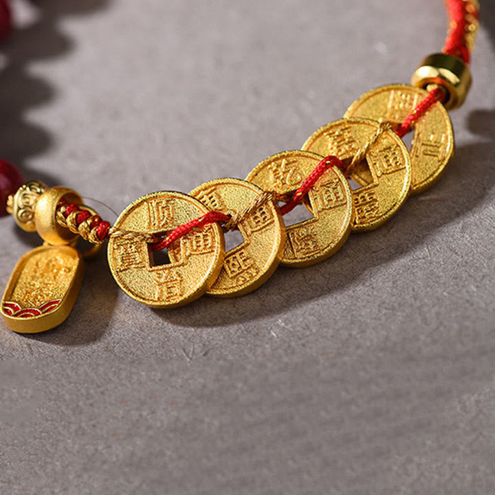 Armband Amethyst Zinnober Balance Glück mit goldenen Münzen rotem Faden