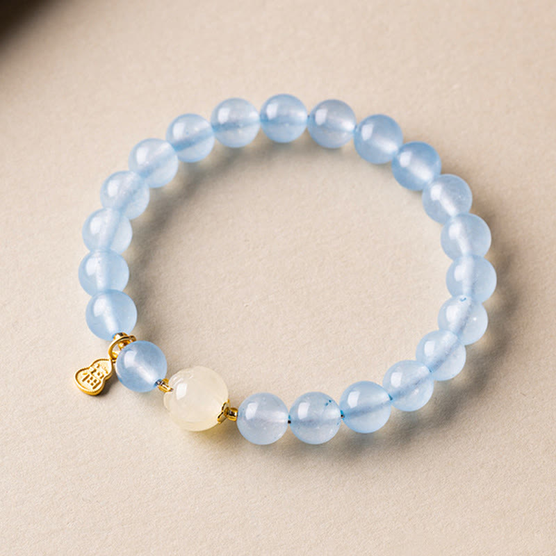 Armband Aquamarin Fu-Zeichen Glück Heilung blaue Perlen goldener Anhänger Handgelenk