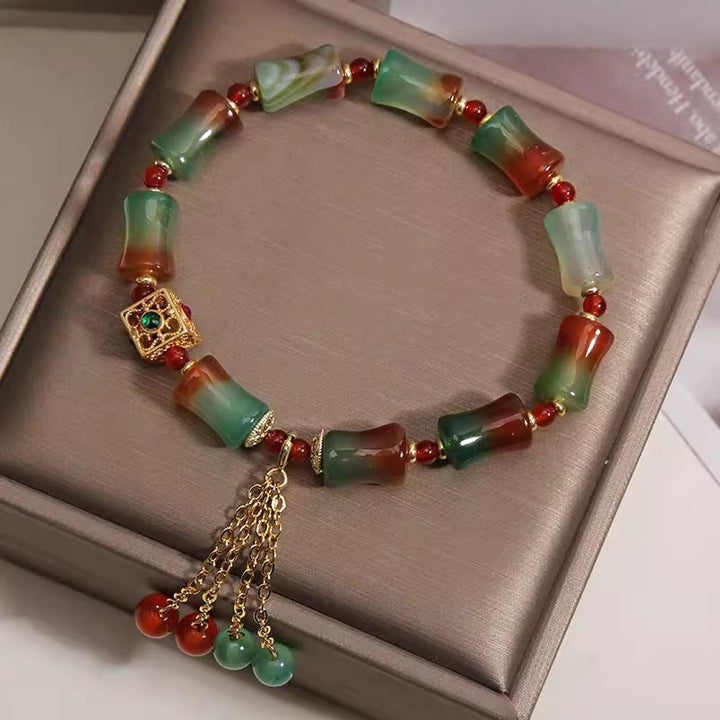 Armband Achat Bambus – Mut mit Quaste rot grün Perlen Schmuckschatulle