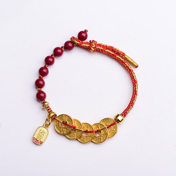 Armband Amethyst Zinnober Balance Glück mit goldenen Münzen rotem Band