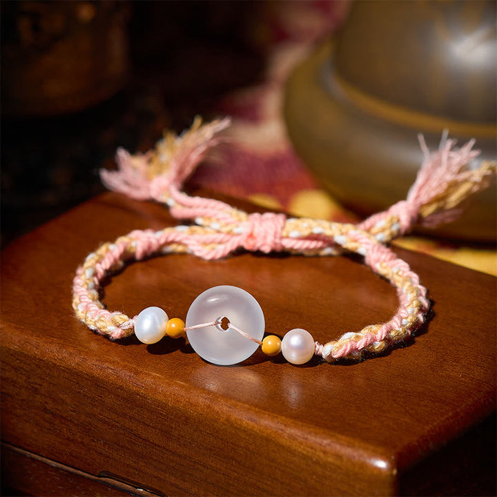 Armband Chalcedon Frieden Positivität geflochten rosa Perlen Holzbox Schmuck