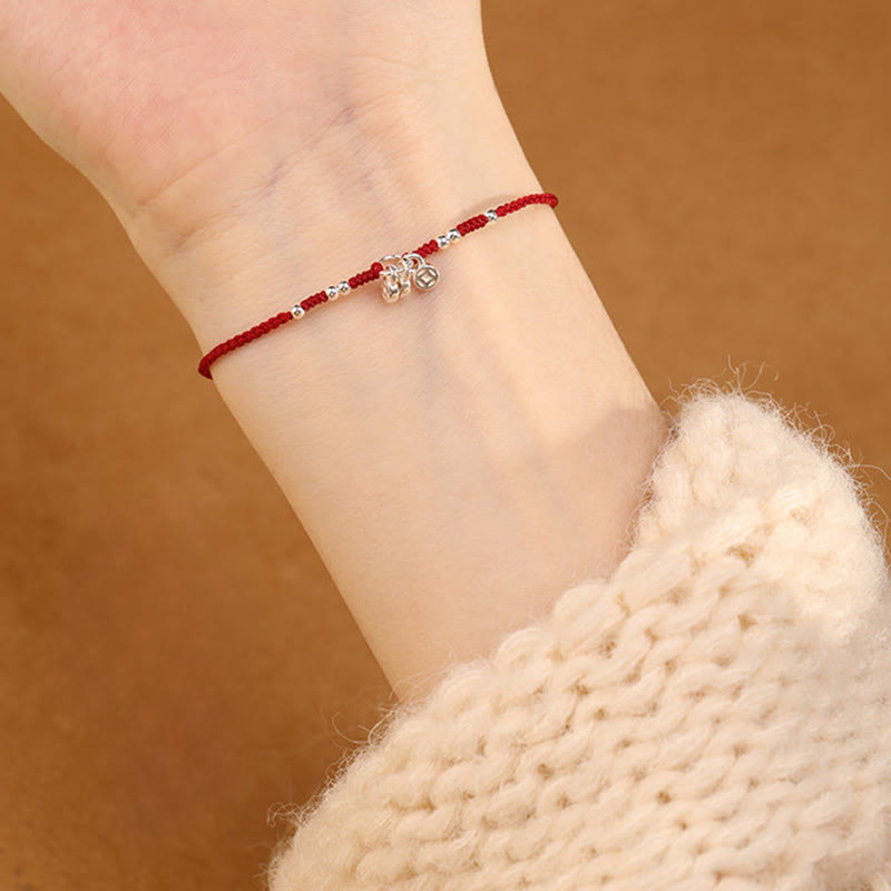 Rotes Armband 925 Silber Kupfer Schutz Stärke am Handgelenk getragen