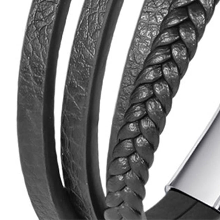 Armband Böses Auge Balance schwarzes Leder geflochten Edelstahl Verschluss Detailaufnahme