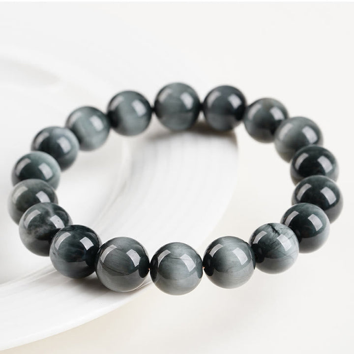Armband Adlerauge Energie Ruhe dunkle Edelsteinperlen Schutz Handgelenk natürlich elegant