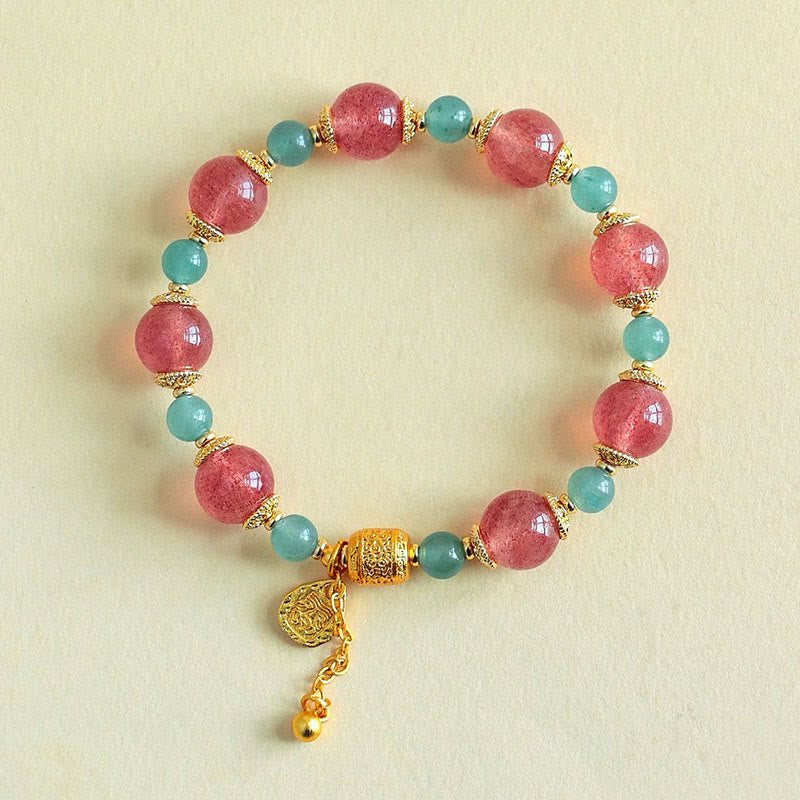 Armband Erdbeerquarz Mondstein Mond Heilung Positivität rosa türkis goldener Anhänger