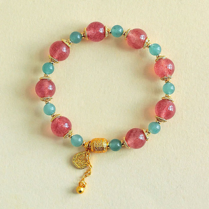 Armband Erdbeerquarz Mondstein Mond Heilung Positivität rosa türkis goldener Anhänger