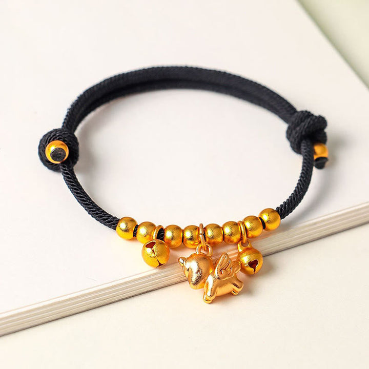 Armband mit schwarzer Schnur goldenen Perlen und Pferd Anhänger Glück Stärke