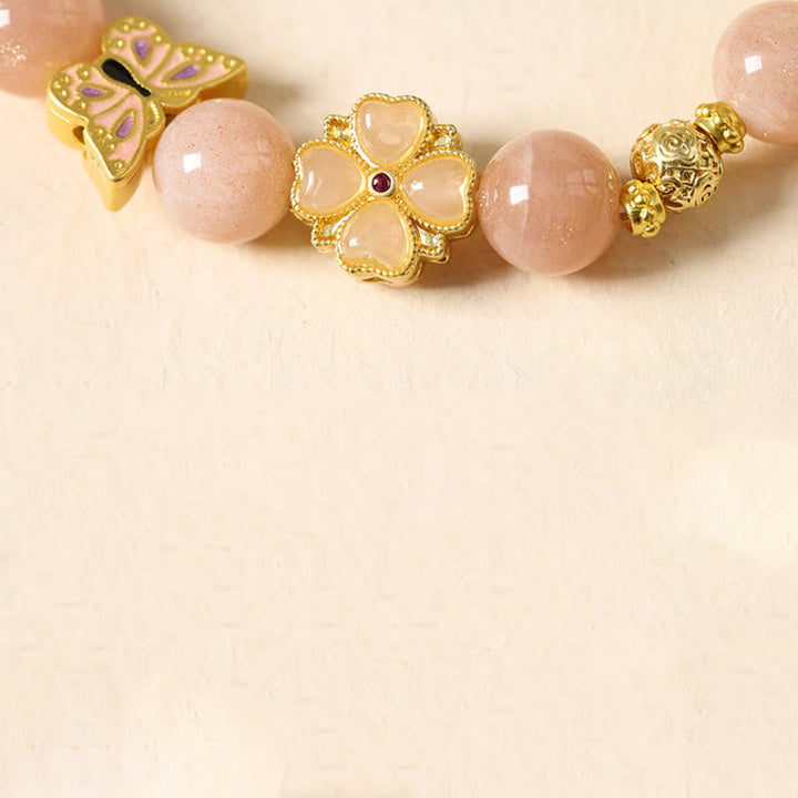Armband Turmalin Roter Achat Erfolg mit goldenem Schmetterling Blüte Perlen