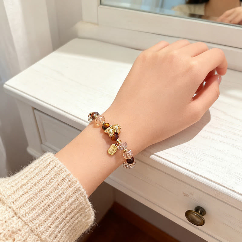 Armband Tigerauge Obsidian Glück Wohlstand Energie am Handgelenk getragen
