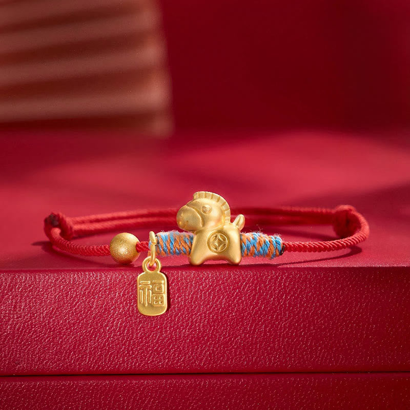 Armband Fu-Zeichen Glück Stärke rotes Seil goldenes Pferd Anhänger
