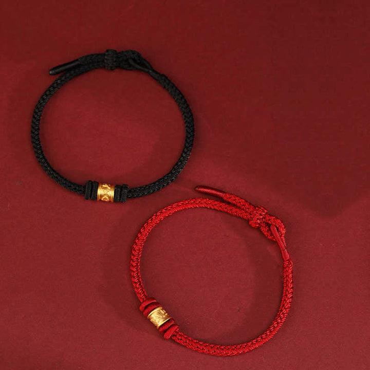 Armband Om Mani Padme Hum geflochten schwarz rot Schutz Glück Balance