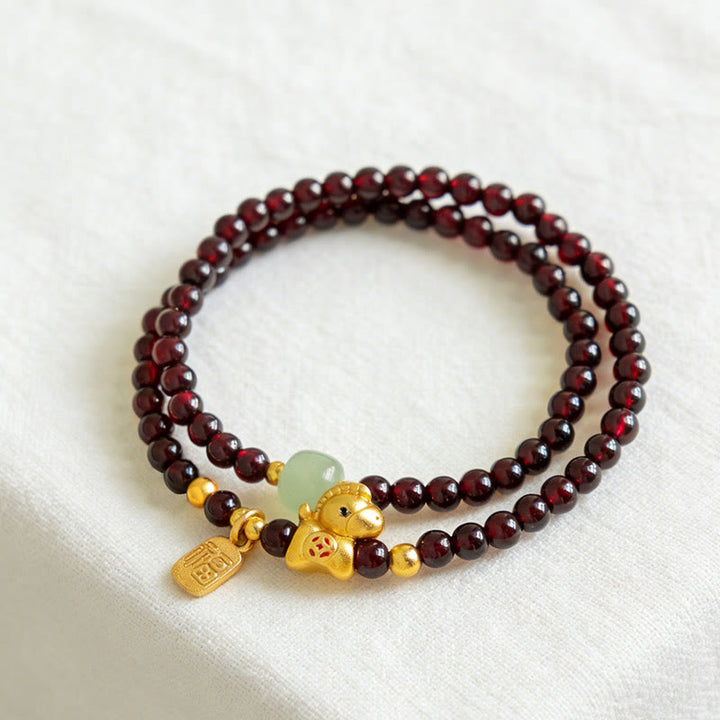 Armband Granat Jade Fu-Zeichen Stabilität Glück Schutz am Handgelenk