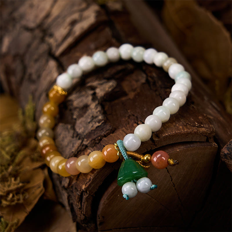 Armband Jade Lotus Glück Frieden Energie Perlen auf Holz natürlich