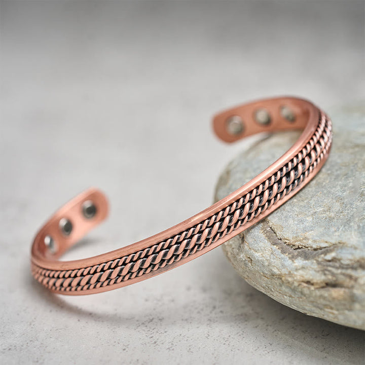 Armband Kupfer Glück Balance Harmonie magnetisch geflochten auf Stein Naturmotiv