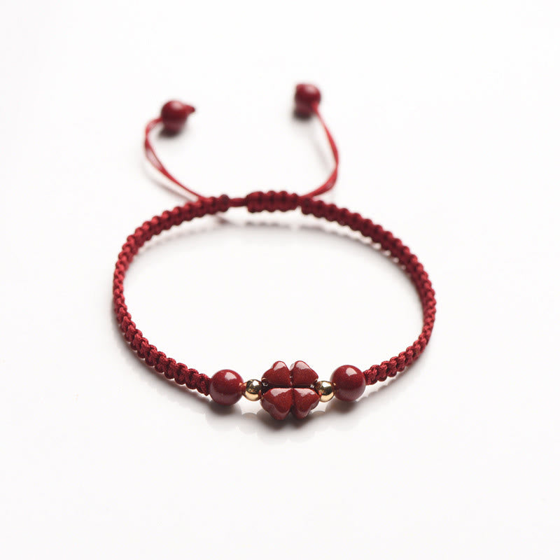 Armband Zinnober Kleeblatt Liebe Segen Energie rotes geflochtenes Glücksband
