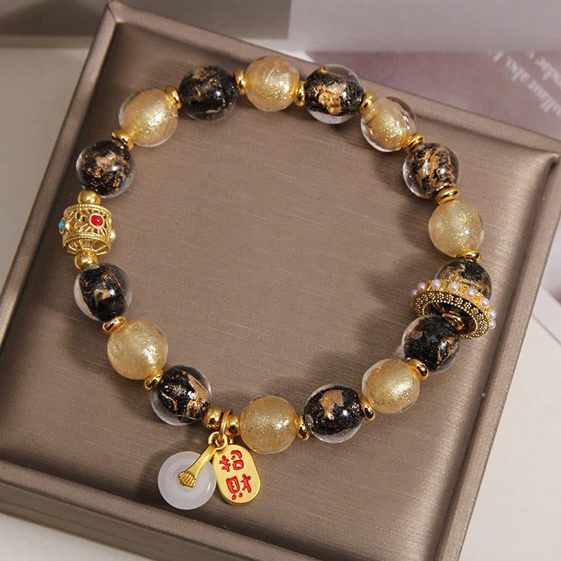 Armband Liuli Wohlstand Frieden Glasperlen gold schwarz mit Jade Anhänger