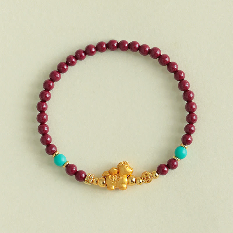 Armband Zinnober Fu-Zeichen Ruhe Energie goldene Ziege Türkis Perlen