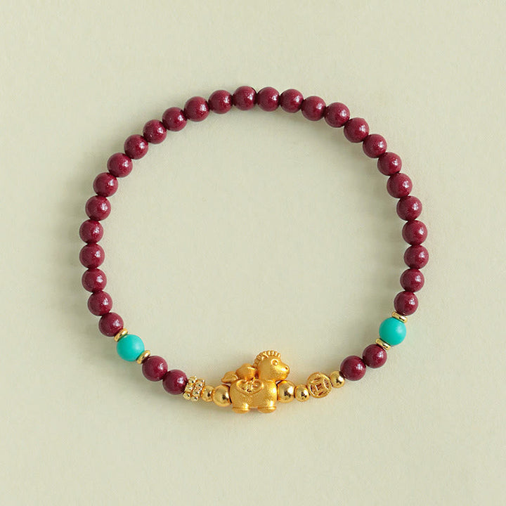 Armband Zinnober Fu-Zeichen Ruhe Energie goldene Ziege Türkis Perlen