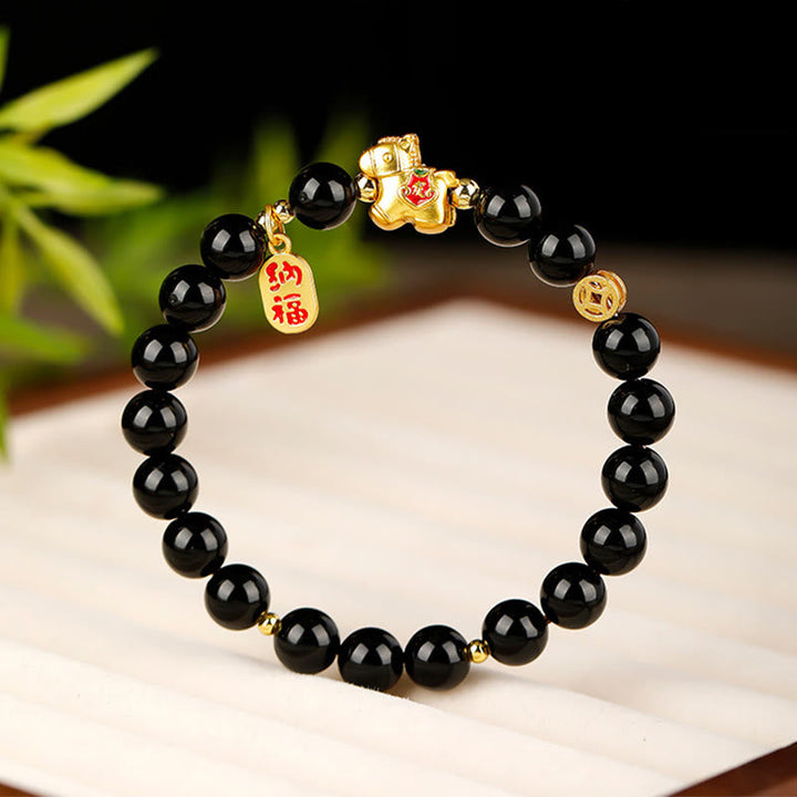 Armband Schwarzer Obsidian Stärke mit goldenem Pixiu Anhänger Glück Schutz