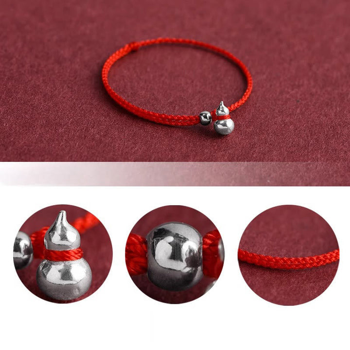Armband 925 Silber Kürbis Glück rote Schnur Detailansicht Handgelenk Schmuck