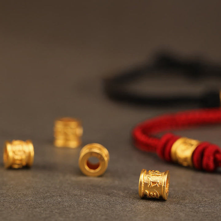 Armband Om Mani Padme Hum Schutz Glück Balance goldene Perlen rote Schnur