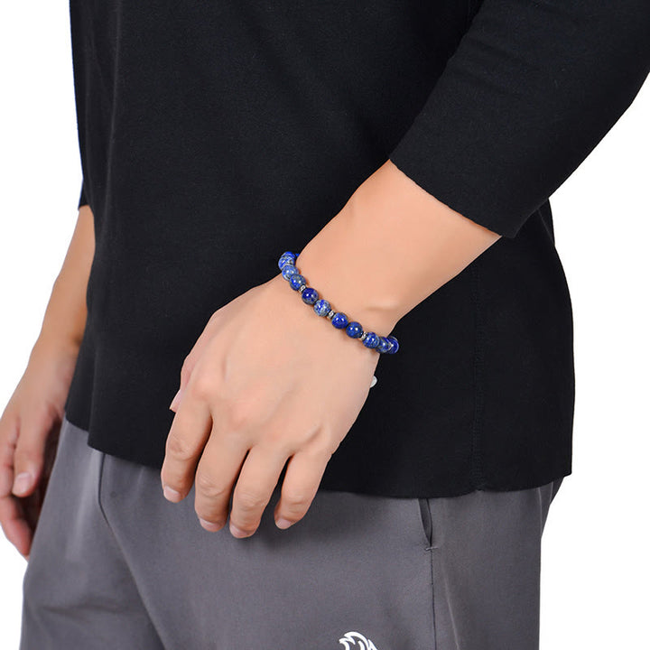 Armband Tigerauge Tiger Various Schutz am Handgelenk getragen blaue Perlen