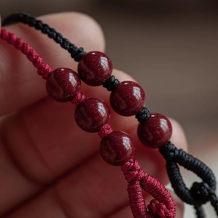 Armband Zinnober Segen Ruhe rote Perlen geflochten Hand Schutz Glück