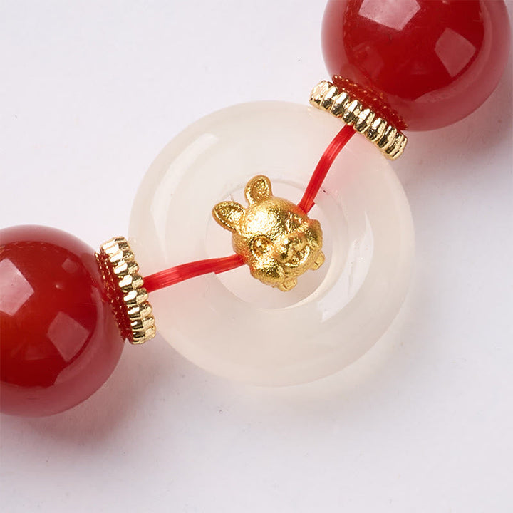Armband Roter Achat Chalcedon Friedensschnalle Selbstvertrauen mit goldenem Tiger Detail
