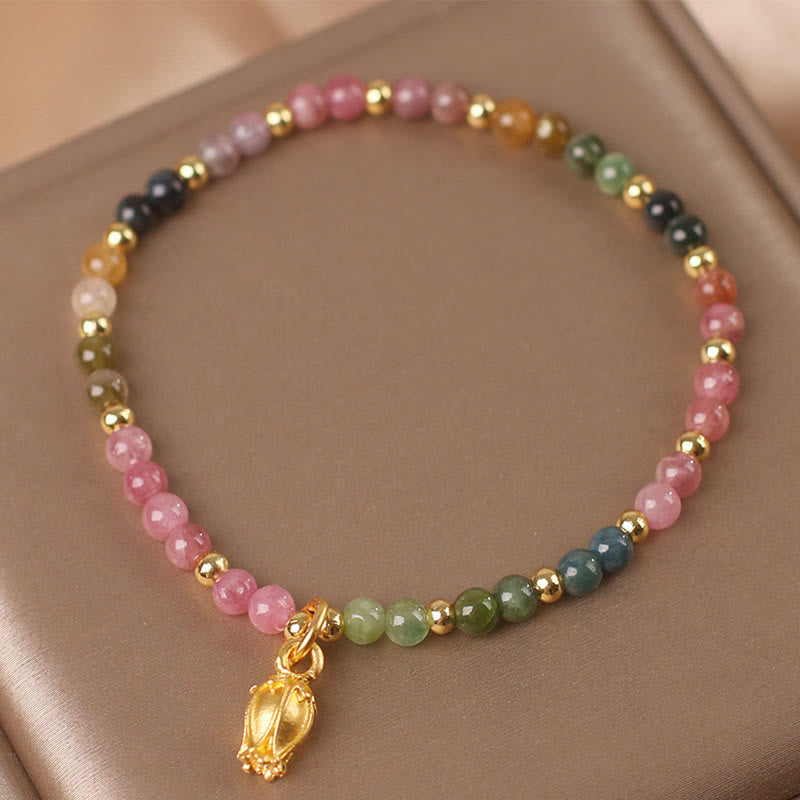 Armband Turmalin Blüten mit bunten Perlen goldene Spacer Energie