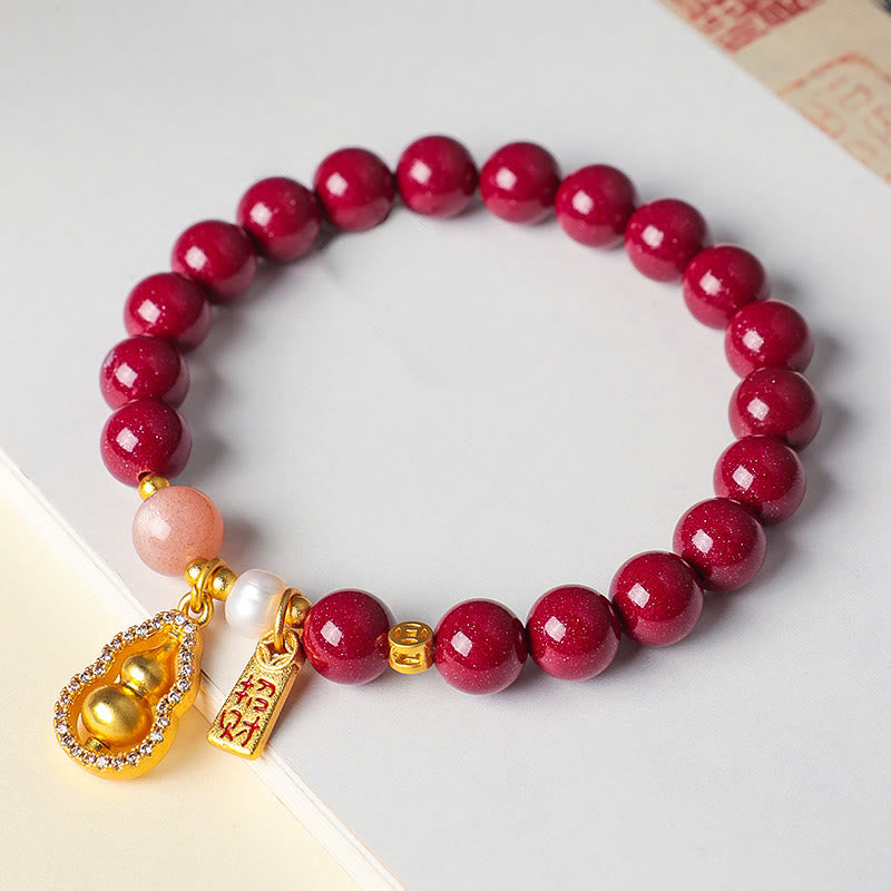 Armband Zinnober – Segen & Glück mit goldenem Kürbis Anhänger und Perle