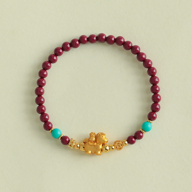 Armband Zinnober Fu-Zeichen Ruhe Energie Perlen Türkis goldenes Pferd