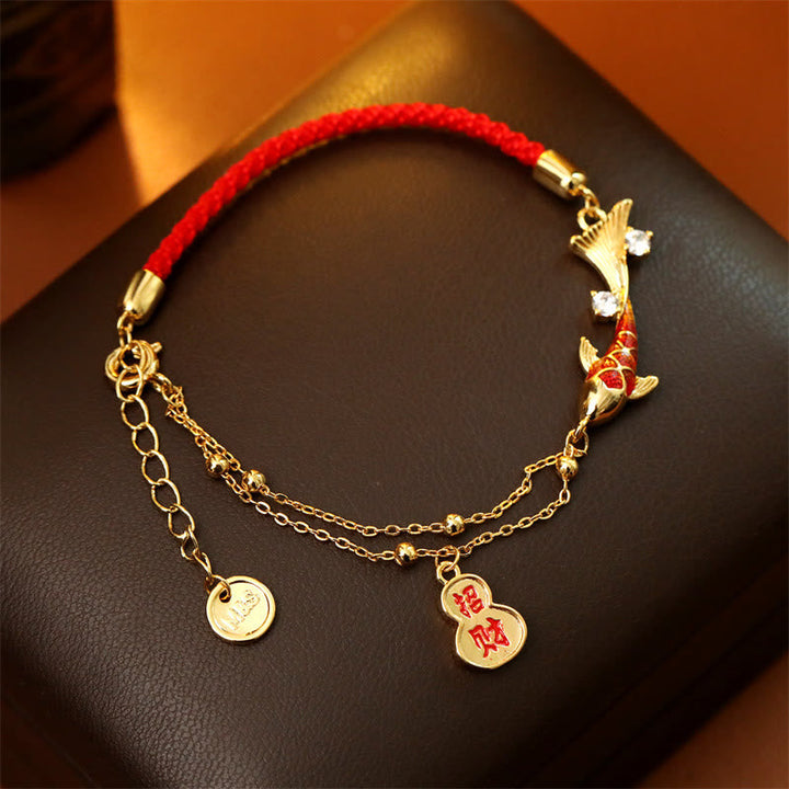 Armband Koi Fisch Glück Wohlstand Stärke rotes Band goldener Anhänger