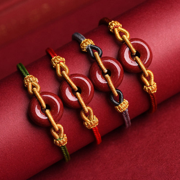Armband Zinnober Frieden Segen Energie vier Varianten rot golden.