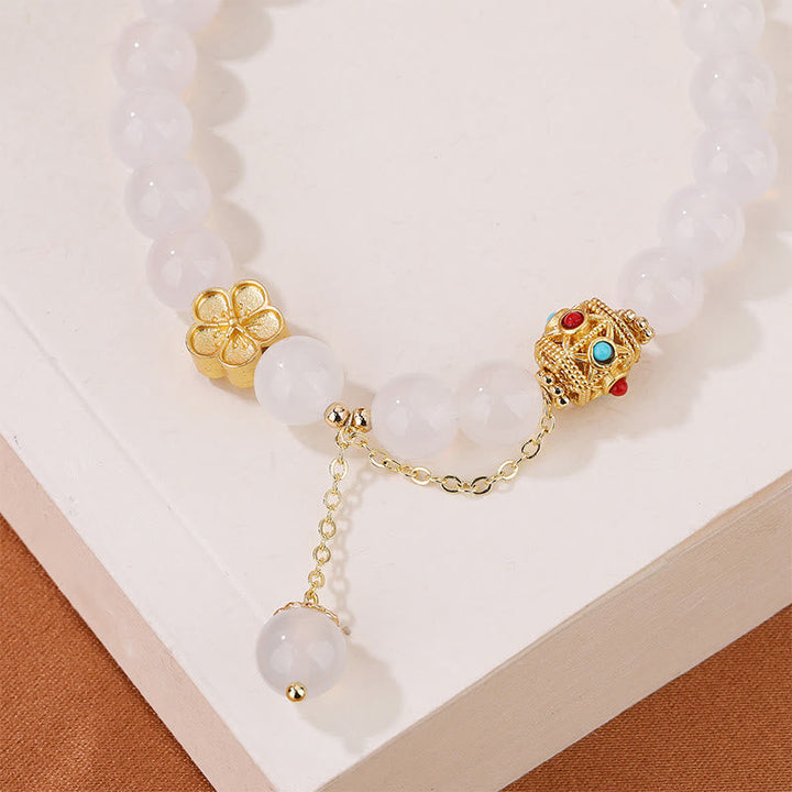 Armband Roter Achat Pfirsichblüte mit weißem Stein goldenem Verschluss elegant