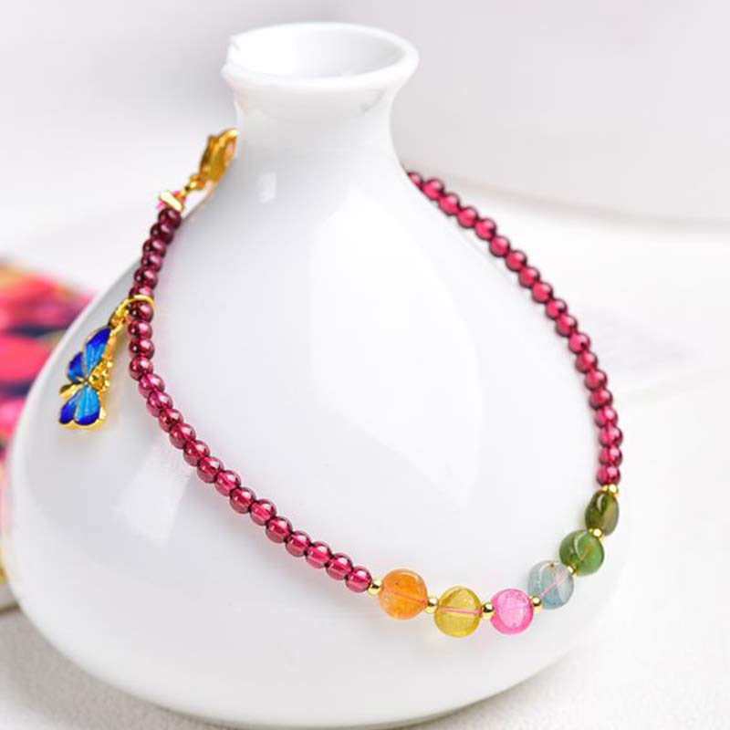 Armband Granat Schmetterling – Schutz bunter Kristallperlen goldene Akzente elegant.